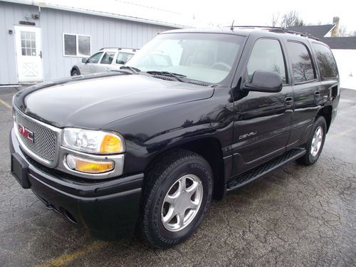 2002 gmc yukon denali awd,runs well,dvd screen,sunroof,no reserve.