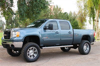 Lifted duramax diesel crew cab 4x4 new wheels new tires new lift kit navigation