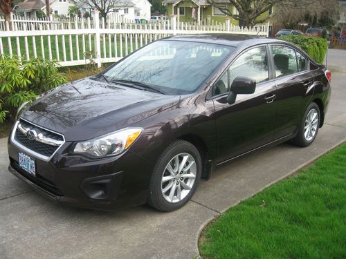 2012 subaru impreza 2.0i sedan with pzev.  5 speed manual