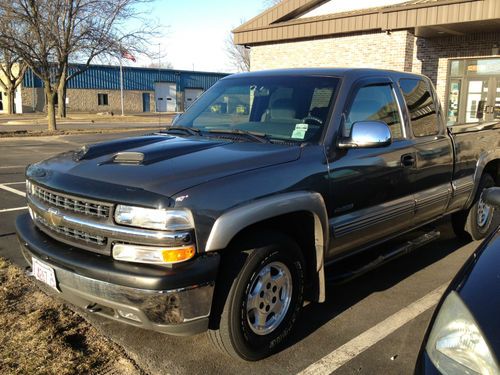 2002 chevy silverado z71 off road 1500 low miles, below blue bk, custom topper!