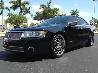 *strut pkg* navigation - 20" wheels - thx sound - xenon lights - black beauty !