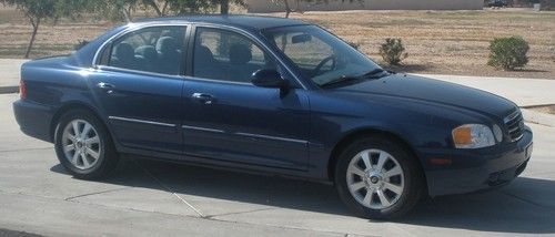 2004 kia optima lx v6 2.7l - runs and drives good! cel issue - selling cheap!