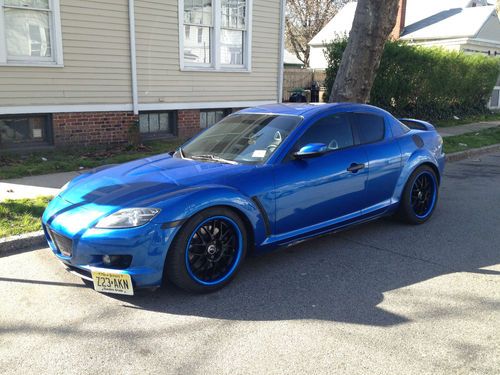 06 mazda rx-8 blue, good condition , xxr rims , agency power racing exhaust