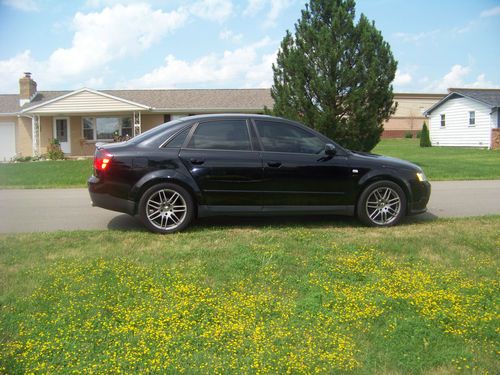 Audi a4 s-line package,1.8 liter turbo,black,leather,heated seats,sport package