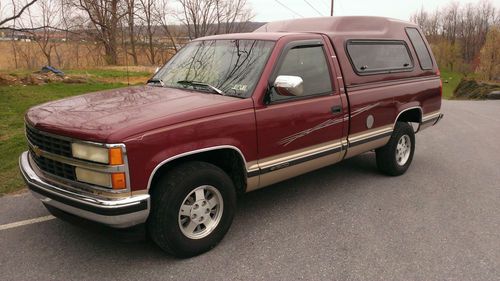 1993 chevy 1500 2 wheel drive, single cab, fiberglass topper, bed liner.