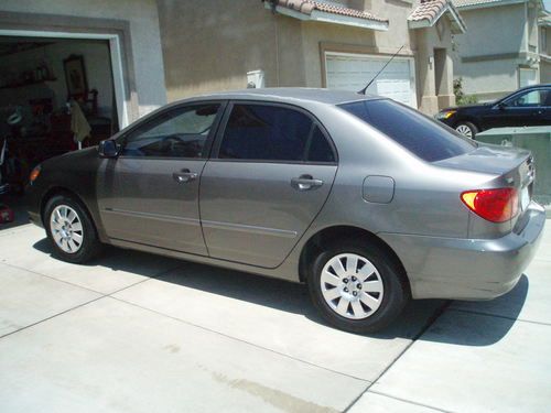 2004 toyota corolla le sedan 4-door 1.8l 35 miles per gallon