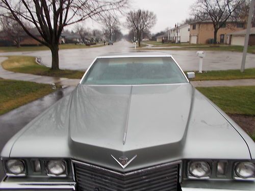 Custom painted cadillac with white walls