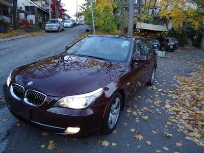 One owner garage kept  low miles 535xi awd very clean