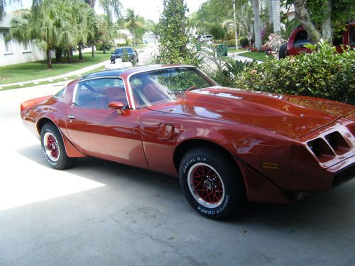 1979 firebird trans am - candy red , f-body t-top with no rust or leaks anywhere