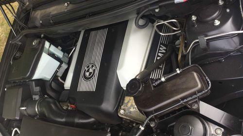 2001 BMW X5 with 4.4L DOHC 32-valve V8- Sport Package - Navigation - Black/Black, image 10