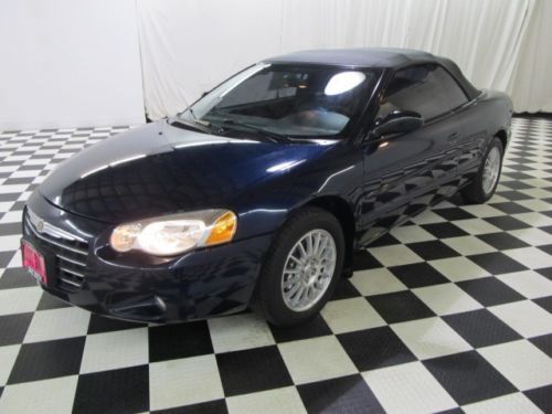 05 convertible, cd player, rear defrost, tint, leather upholstery. we finance