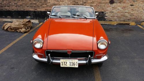 74 mgb with chrome bumpers and recently rebuilt dual carburetors