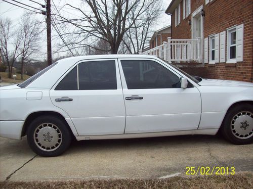 White,sun roof, 4 door sedan, cd player,excellent condition,tinted windows,