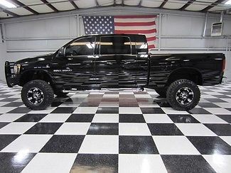 Black mega cab 5.9 cummins diesel auto low miles 4&#034; lift 35&#034; tires extra&#039;s clean