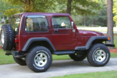 1997 jeep wrangler sport sport utility 5.3 liter chevrolet engine 5 inch lift