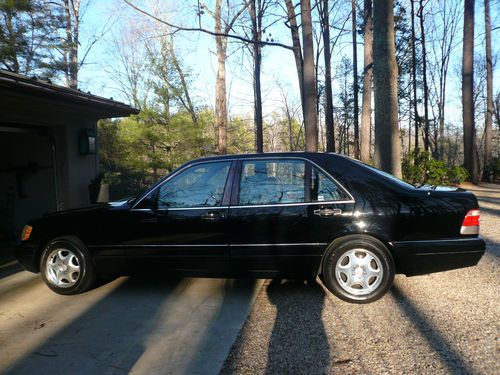 1999 mercedes s320 - mint condition - black, black leather.  one owner, garaged.