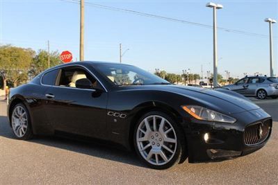 2009 black maserati gran turismo 2door coupe