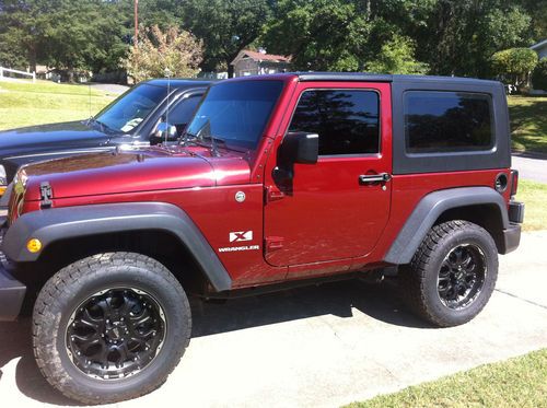 Jeep wrangler "x" jk.  burgandy in color