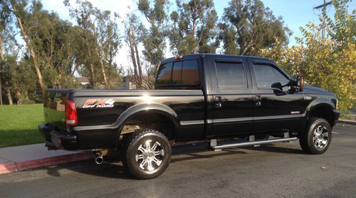 Black ford f250 truck super duty crew cab 4 door remote start airbag suspension