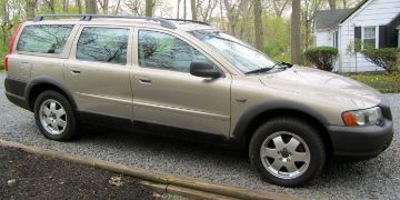 Volvo v70..2003..5 speed ..ash gold ext. /beige sand int.  128k miles