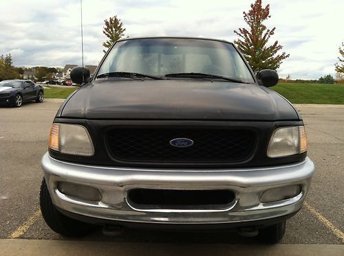 1997 ford f150 xlt supercab 4x4 not pretty, runs like a champ!