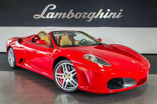 Carbon ceramic brakes+carbon fiber+daytona seats+red tach+scuderia shields+hifi