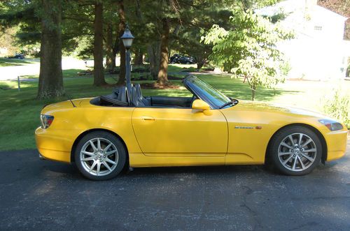 2005 honda s2000 sports car finished in bright yellow