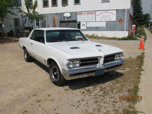 1964 pontiac gto highly optioned ,very collectable, 4 spd air  w/window sticker