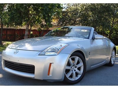 2004 nissan 350z roadster 2doors 3.5l v6 , auto trans, clear title, no reserve.