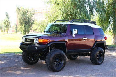 Lifted 4x4 suv fabtech lift kit with front coil overs, custom front/rear bumpers