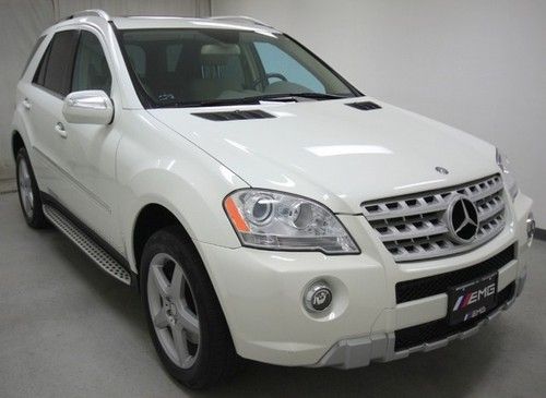 We finance white benz ml550 v8 navigation  sunroof clean carfax miles 43k