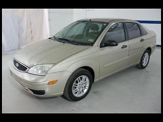 06 ford focus 4 door sedan, power windows and locks, we finance!