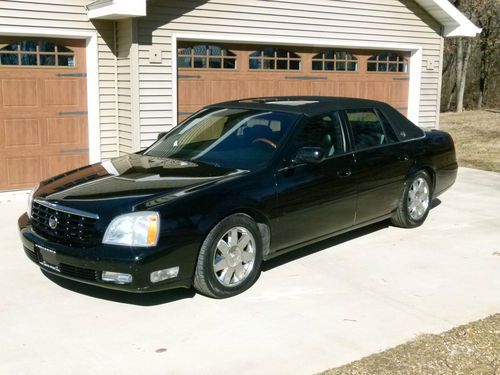 2004 black cadillac deville dts, beautiful leather, runs great, loaded