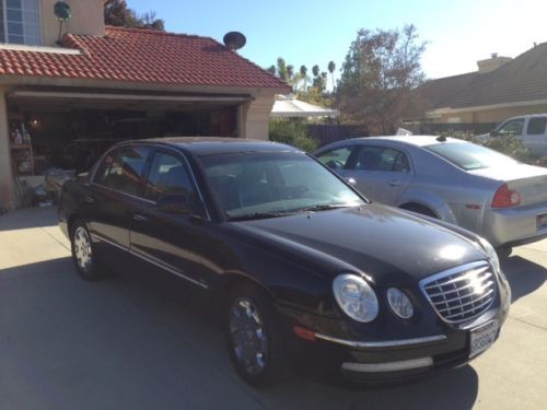 Black on black, 2008 kia amanti, loaded!  all options!  68,000 miles