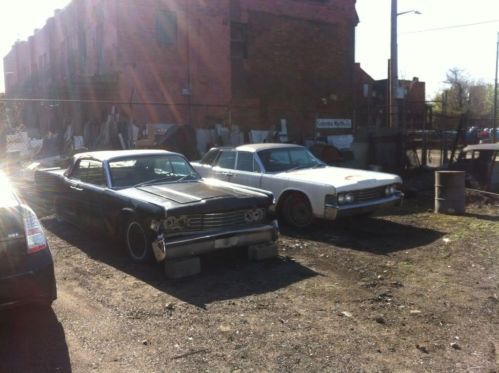 2 -1965 lincoln continental parts cars 1 triple black convertible,1 white sedan