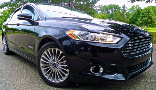 2014 ford fusion hybrid / navigation/blis/ sunroof/ rear camera/ park asst !!!!