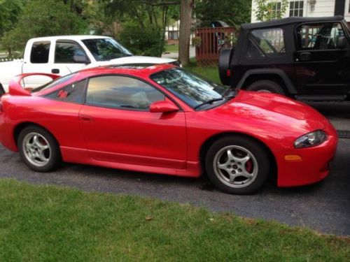 1997 mitsubishi gst eclipse red, very little rust. a few minor scrapes and dings