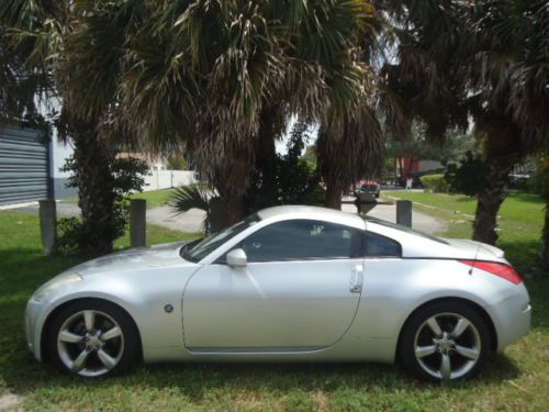 Bright Silver, black leather interior, 2 door coupe, image 2
