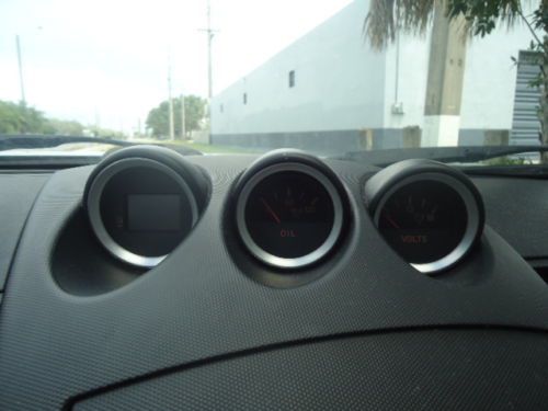 Bright Silver, black leather interior, 2 door coupe, image 6