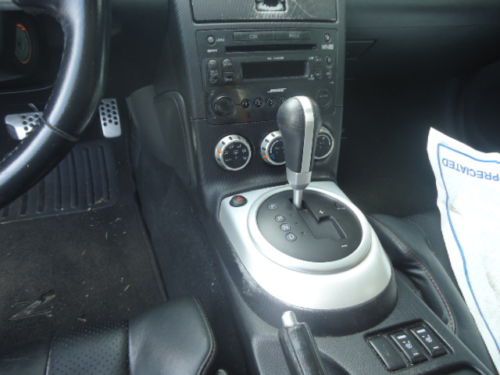 Bright Silver, black leather interior, 2 door coupe, image 7