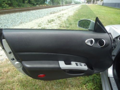 Bright Silver, black leather interior, 2 door coupe, image 9