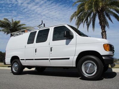 Ford e250 cargo van with work bins shelves ladder racks