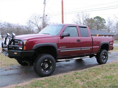 05 chevy 2500 xcab ls 4x4. jacked up!sharp!affordable!.super clean.xtras.!!