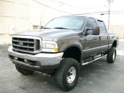 No reserve! turbo diesel lariat fx4. fully lifted. leather interior. clean title