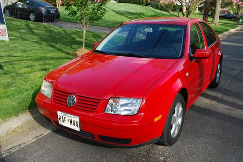 Vw jetta tdi, 4 door sedan, red, automatic, 89k, one owner.