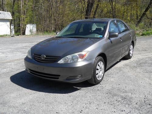 2004 toyota camry le 4 door sedan- clean carfax , very clean, runs great