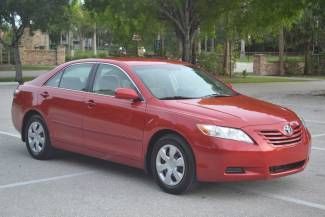 2007 toyota camry le red 2.4l engine, automatic, 33mpg, clean carfax, no reserve