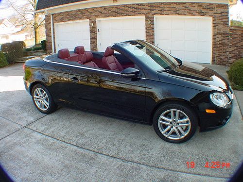 2009 volkswagen eos lux cv / 10k mi / loaded / 3 yr war/ 0 smokers /garaged