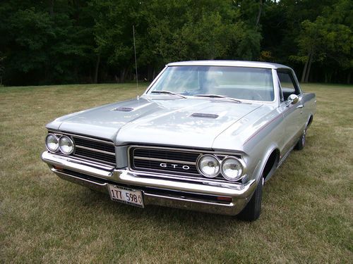 1964 gto hard top 4 speed phs documented numbers matching rotierssier restored