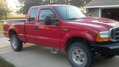 Red, extended cab, v-10 automatic,108,000, aftermarket front bumper